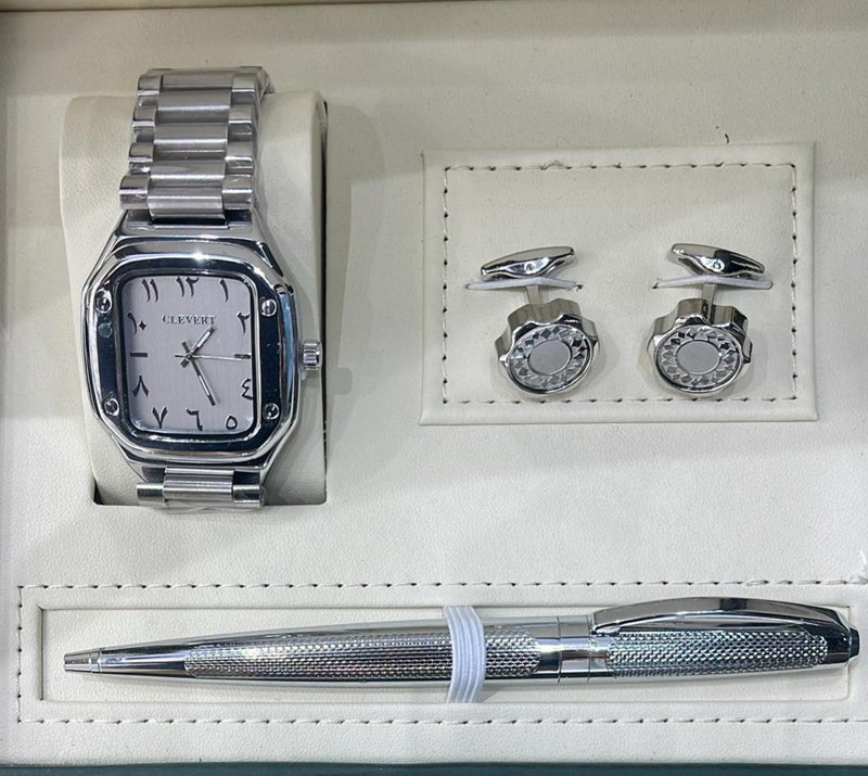 A gift set for men consisting of a wristwatch, a pair of cufflinks, and a ballpoint pen.